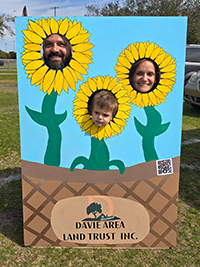 Booth visitor at Davie Land Trust Orange Blossom festival-1