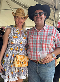 Booth visitor at Davie Land Trust Orange Blossom festival-14