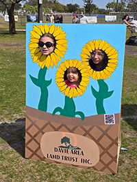Booth visitor at Davie Land Trust Orange Blossom festival-2